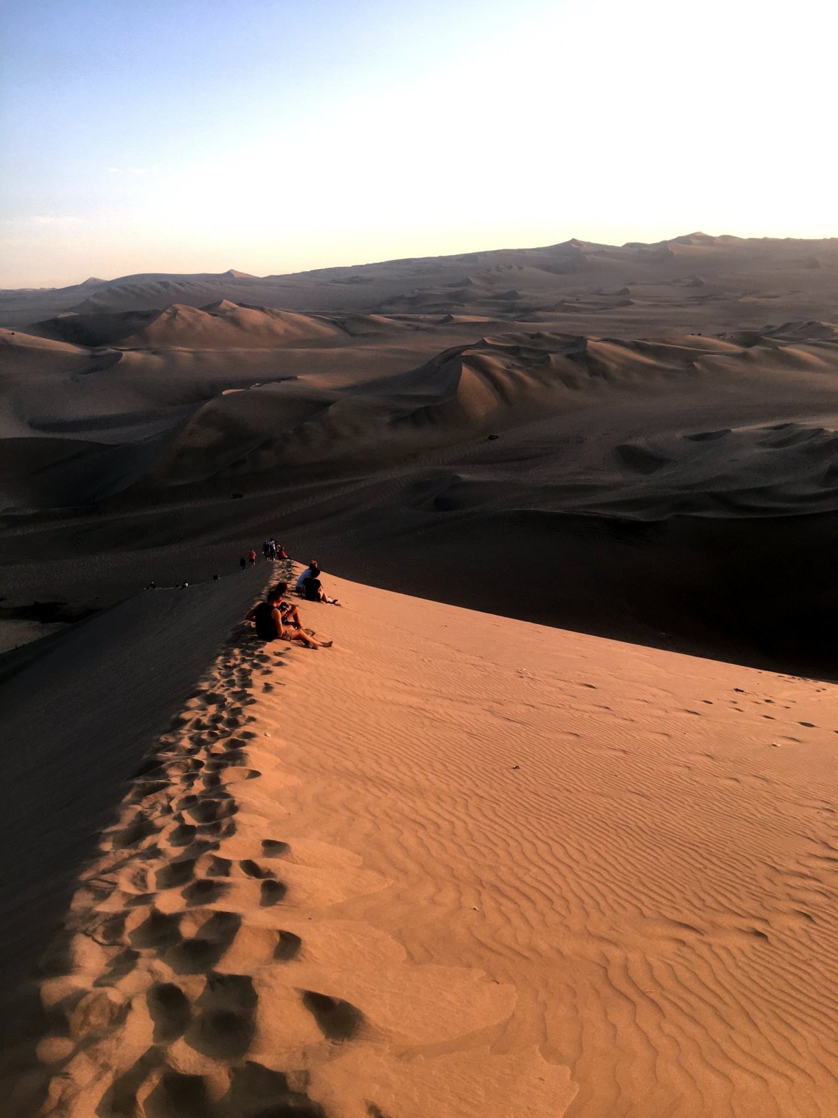 Západ slunce na vrcholu duny