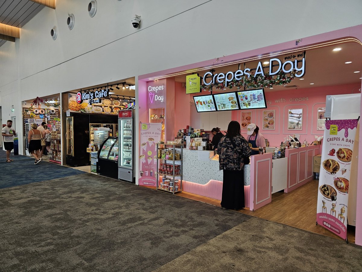 Obchody a kavárny, tranzitní zóna