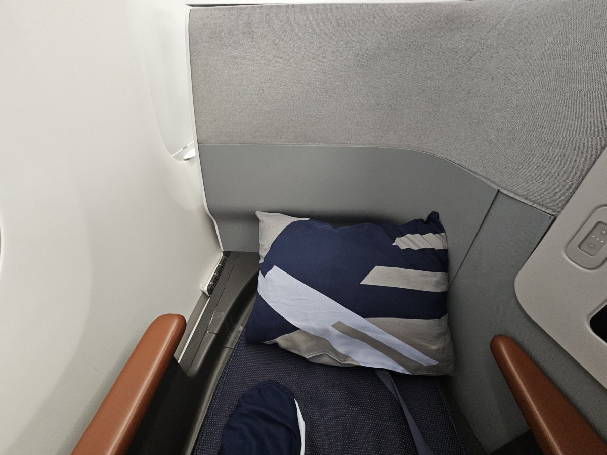 Polštář na rozložené posteli